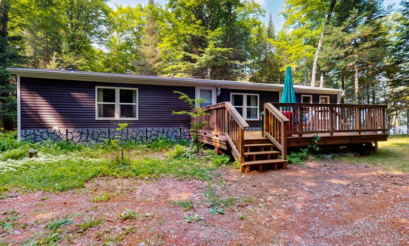 Serene Lakefront Home w/ dock, gas grill, fire pit, WIFI, on ATV trail