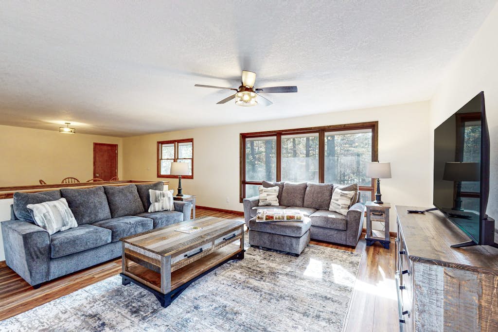 Updated home near downtown Eagle River & beach with fireplace, grill, decks, W/D