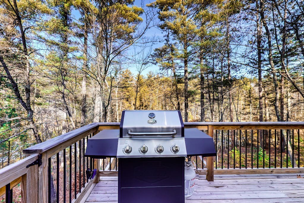 Updated home near downtown Eagle River & beach with fireplace, grill, decks, W/D