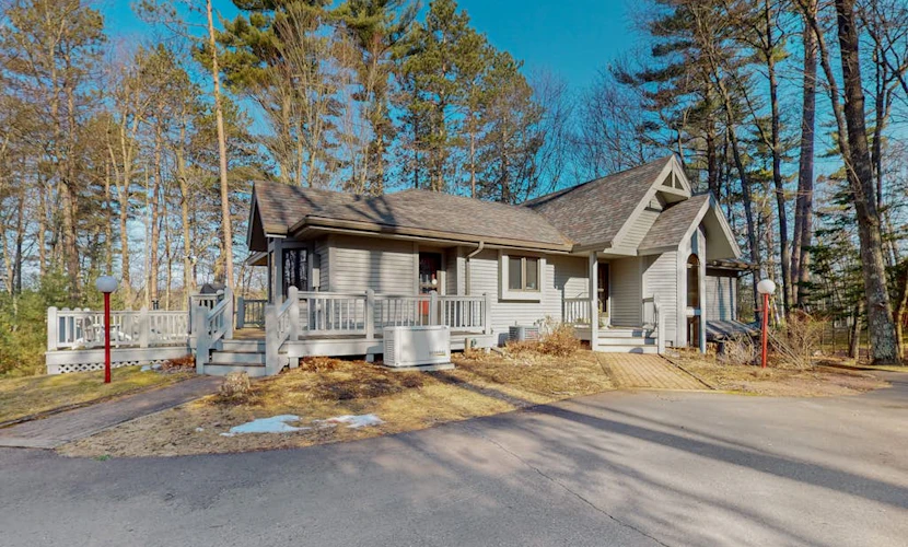 Lakefront home with private outdoor sauna, dock, firepit, wood fireplace & patio