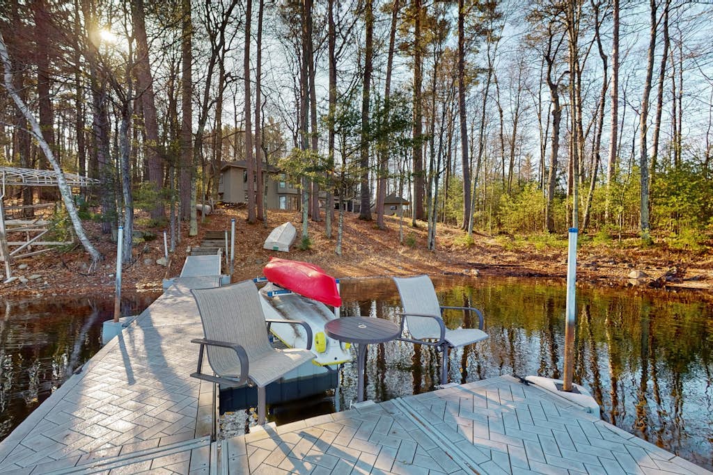 Lakefront home with private outdoor sauna, dock, firepit, wood fireplace & patio