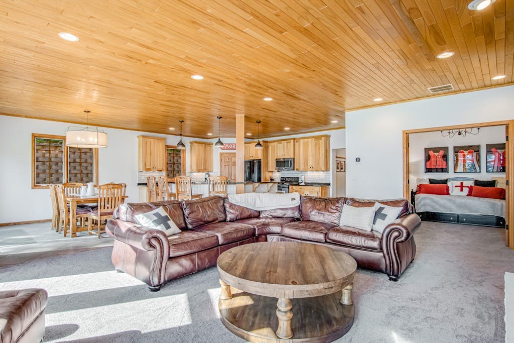 Waterfront condo with lake views, boat slip, grill, beach, AC, fireplace, & WiFi
