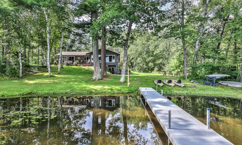 Private waterfront home with dock, kayaks, firepit, & open layout - dog-friendly