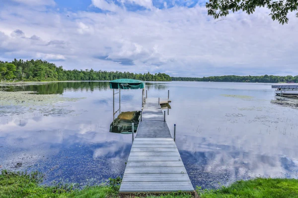 Private waterfront home with dock, kayaks, firepit, & open layout - dog-friendly