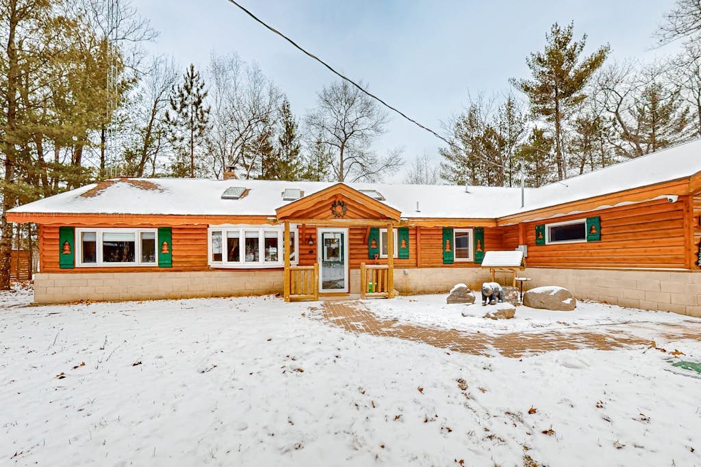 Charming lakefront home with dock, fireplace, streaming, lake views, W/D, & AC