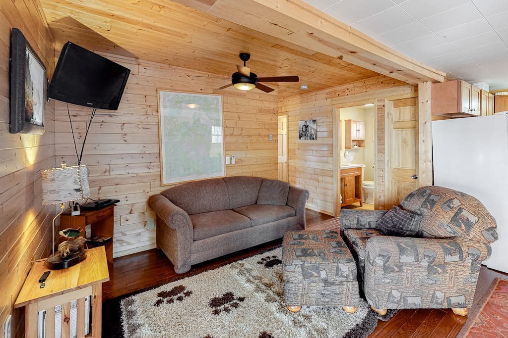 Lakefront home with dock, swimming area, & wood stove - sunset views