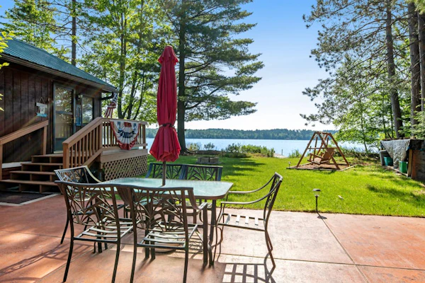 Cozy, lakefront cottage w/ a firepit,kayak,shared patio, gas grill, & free WiFi