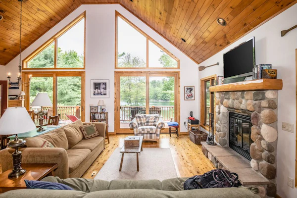 Secluded lakefront cabin with deck, dock, kayak, canoe, & WiFi