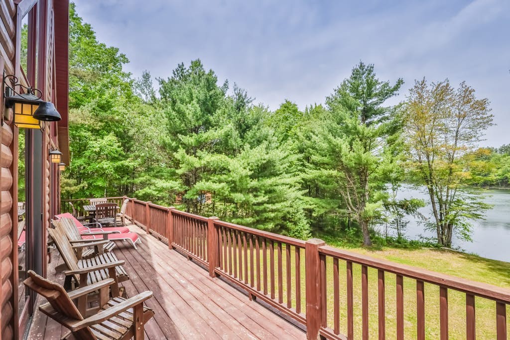 Secluded lakefront cabin with deck, dock, kayak, canoe, & WiFi