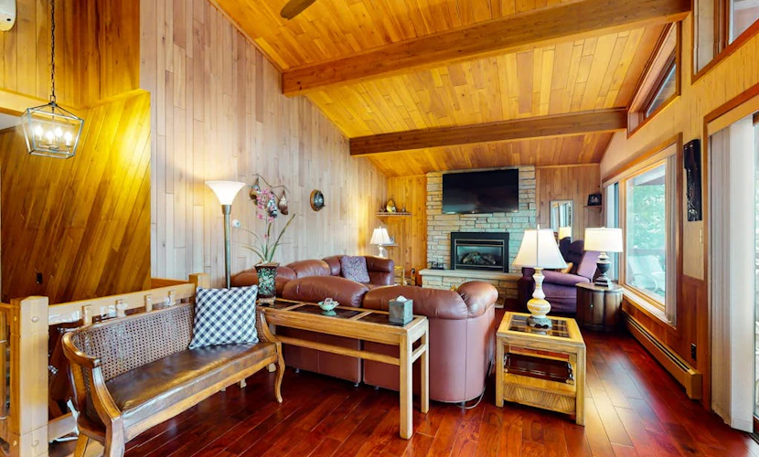 Lakefront home on South Two Lakes with lake views, lake access, firepit, & dock