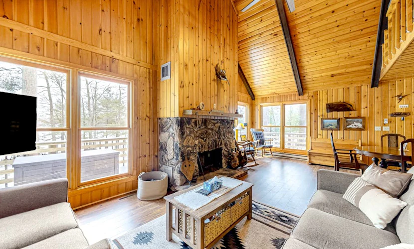 Lakefront dog-friendly retreat with sauna, dock, canoe, paddle board, & firepit