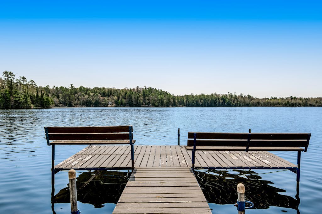 Charming lakefront home with a private dock, gazebo, and W/D