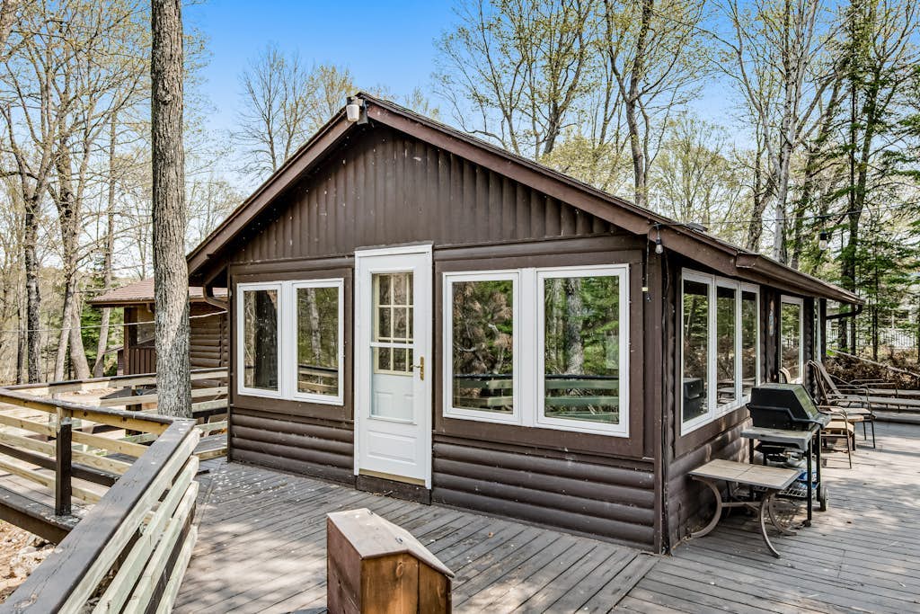 Charming lakefront home with a private dock, gazebo, and W/D