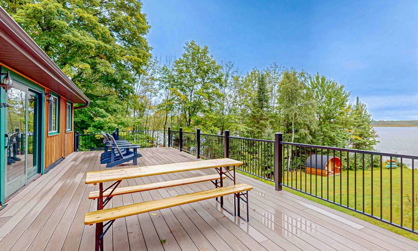 Dog-friendly lakefront home with boat access, deck, fireplace, gas grill, kayaks