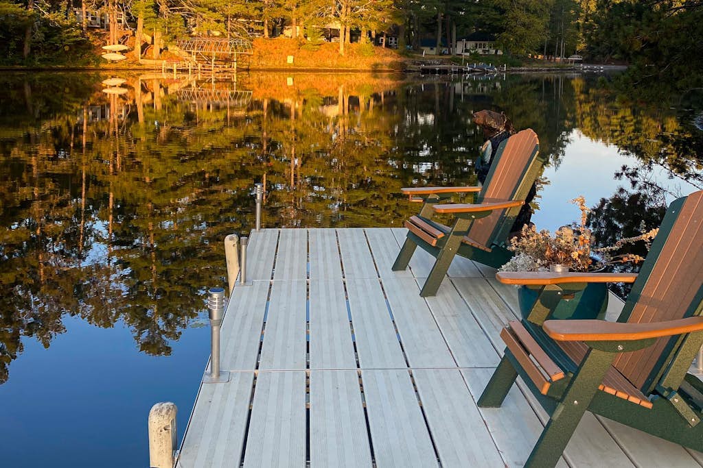 Riverfront home on the Manitowish Riverway w/ dock, fire pit, & outdoor mini bar