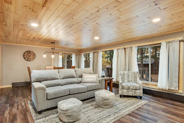 Renovated lake-view retreat with full rec lake access, boat slips, & firepits