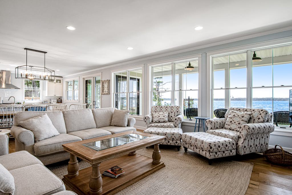 Two dog-friendly lakefront homes with docks, kayaks, rowboat, firepits & beach