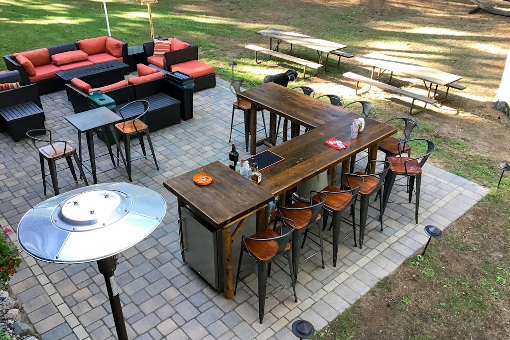 Riverfront retreat: 3BR home & 2BR cabin with docks, fire pits, and lake access