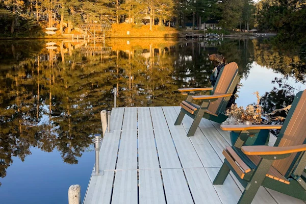Riverfront retreat: 3BR home & 2BR cabin with docks, fire pits, and lake access