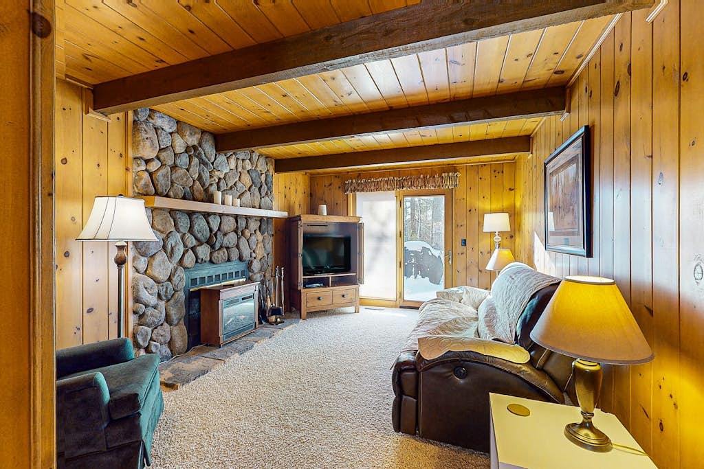 Cozy wooded home w/ access to snowmobile trail, near town, lakes, & bike trails