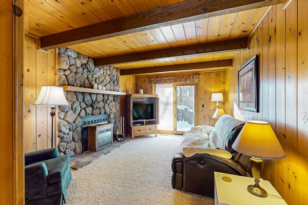 Cozy wooded home w/ access to snowmobile trail, near town, lakes, & bike trails
