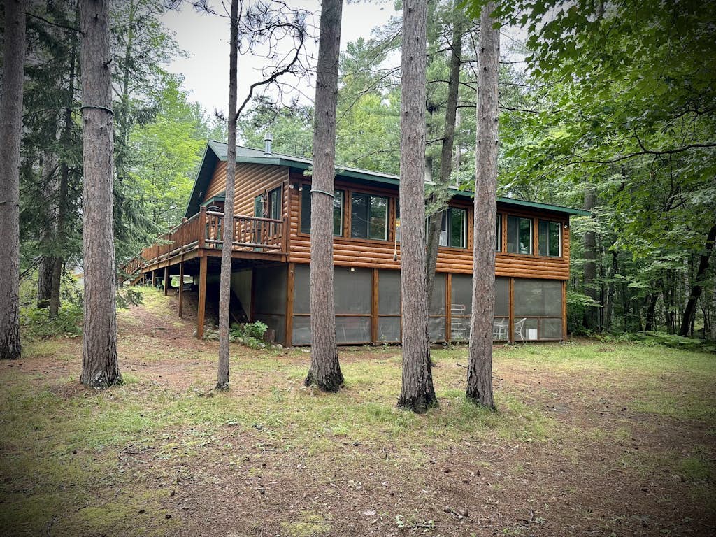 Riverfront home on the Manitowish Riverway w/ fire pit, kayaks & boat house