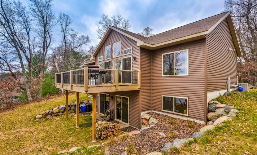 Recreational lakefront home w/ private dock, trails access, & washer/dryer