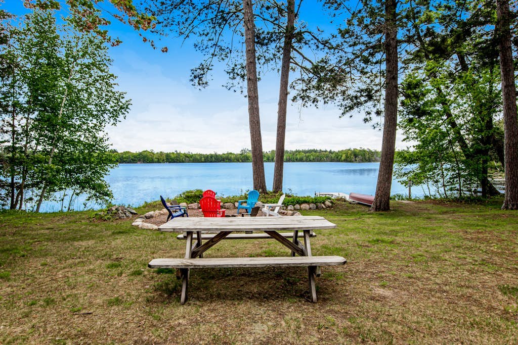 Dog-friendly lakefront home with high-speed WiFi, dock, private w/d, & firepit