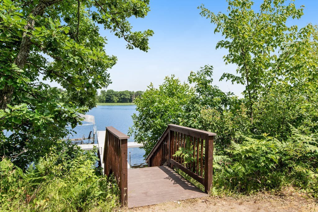 Rustic lakefront home with shared dock & boat slip, game room & stunning gazeebo