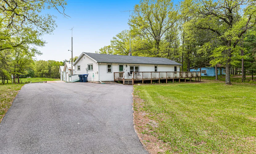 Rural retreat near Necedah National Wildlife Refuge with deck, firepit, & grill