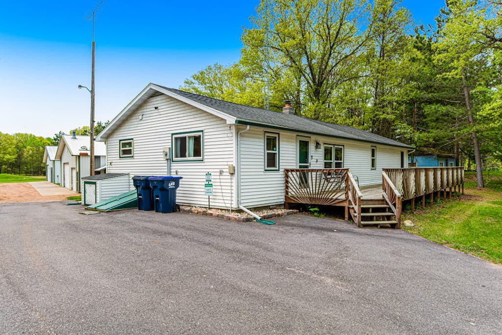 Rural retreat near Necedah National Wildlife Refuge with deck, firepit, & grill