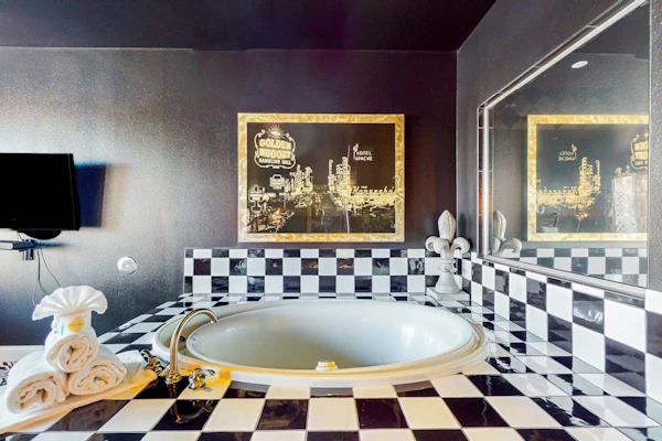 An unforgettable stay awaits at this sultry Delton Grand studio with dance pole