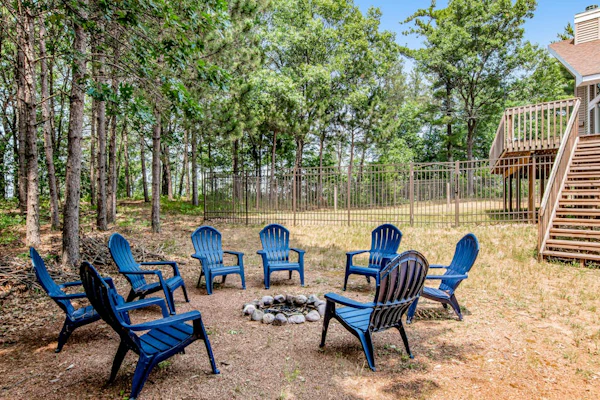 Secluded lake retreat with game room; near beach, boat rental, dining, and golf