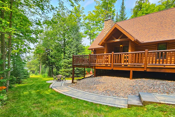 Spacious and beautiful lakefront log home on 7 acres with private dock