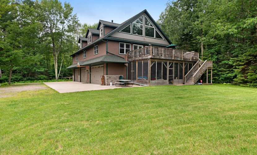 Large, waterfront home w/ a full kitchen, dock, canoes, & outdoor firepit