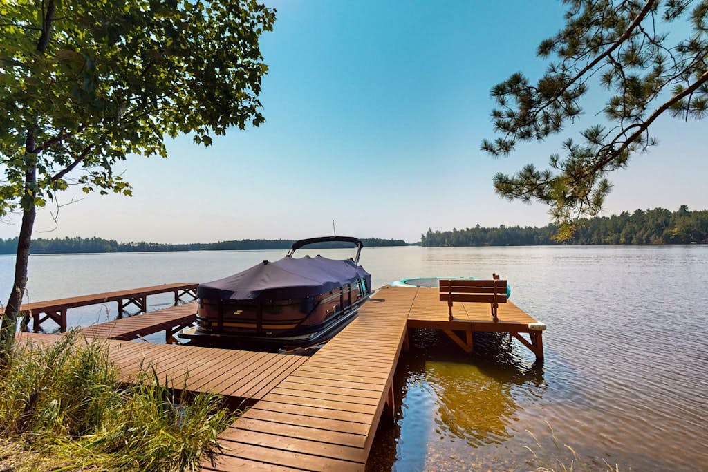NEW lakefront escape with dock, game room, kayaks, 2 master suites & large deck