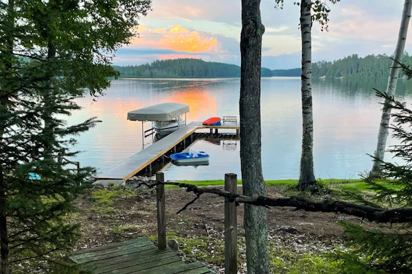 Lakefront home with private dock, deck, fireplace, firepit, canoe & paddleboat
