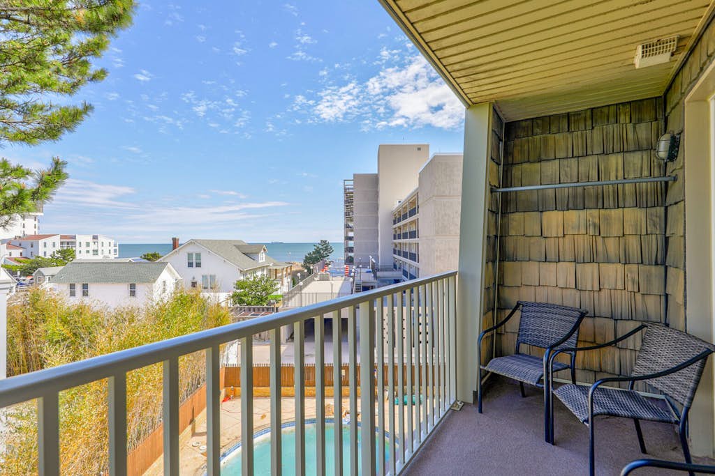 Ocean-view condo near the beach with outdoor pool & central AC