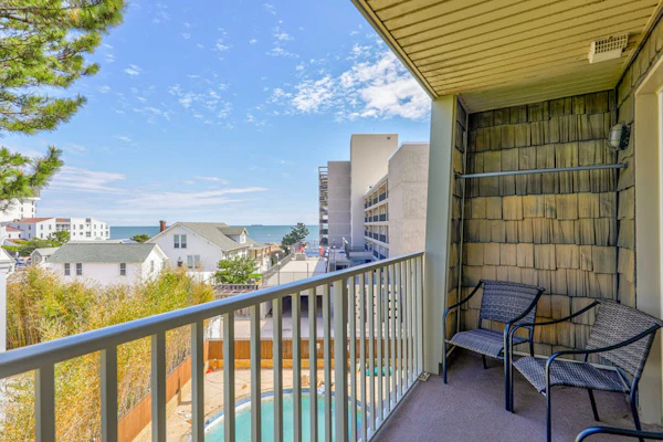 Ocean-view condo near the beach with outdoor pool & central AC