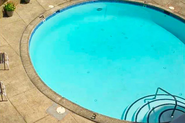 Ocean-view condo near the beach with outdoor pool & central AC