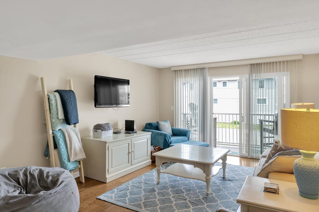 Town of Dewey Beach condo with marina views, pool, balcony