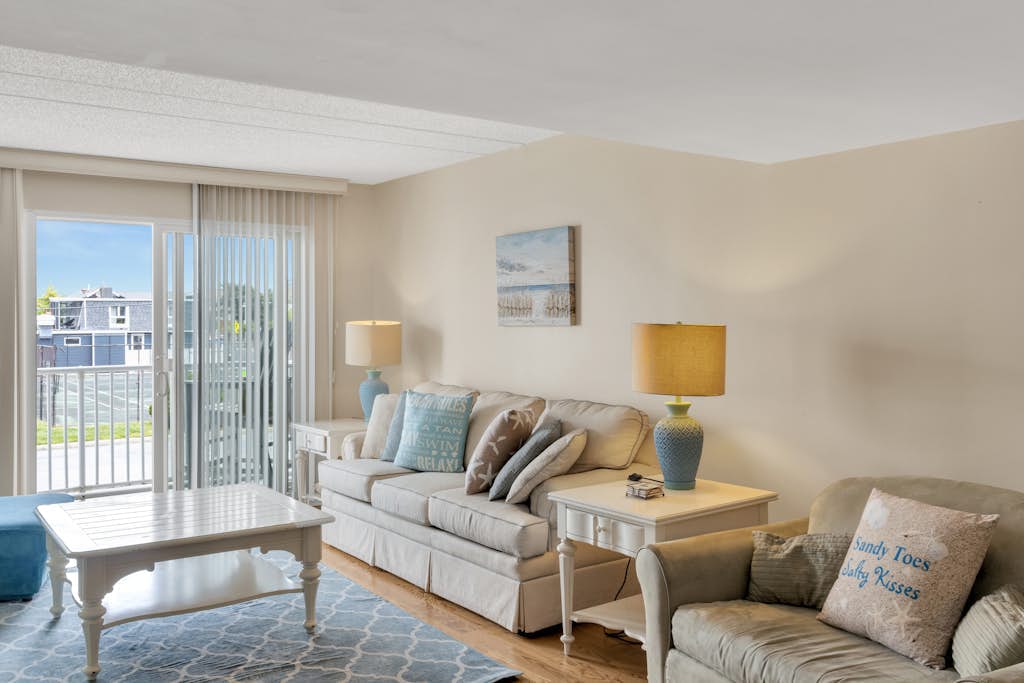 Town of Dewey Beach condo with marina views, pool, balcony