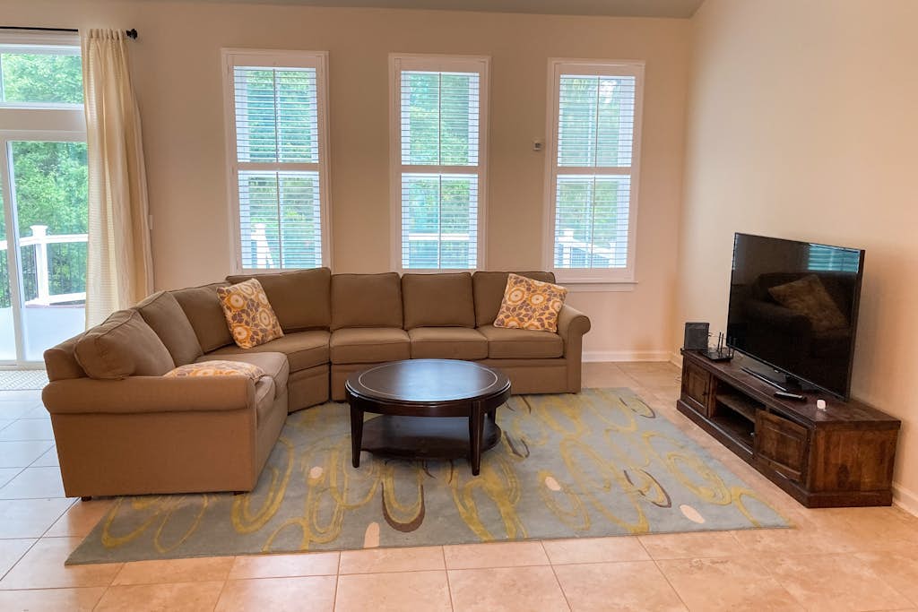 Grande at Canal Pointe home with pools, sports courts, & gym