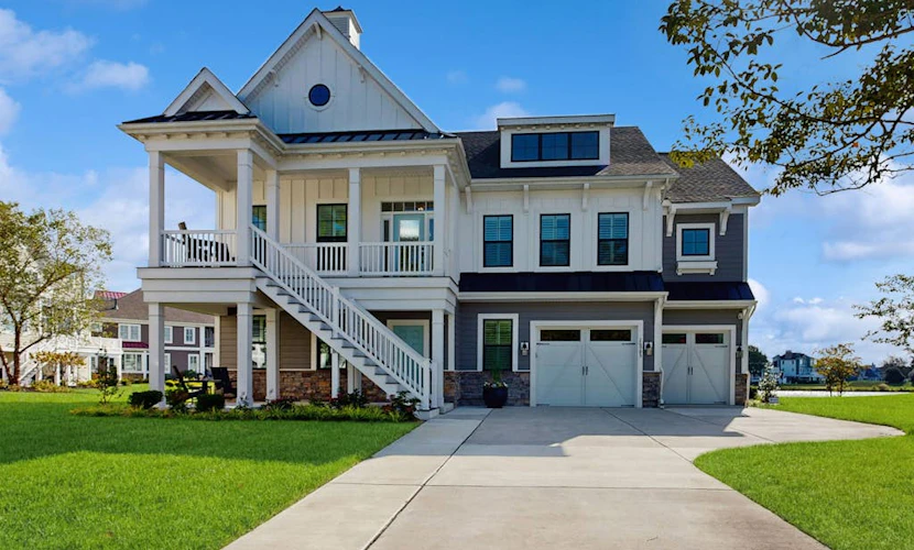 Elegant coastal retreat with golf course & pond views and bayside beach