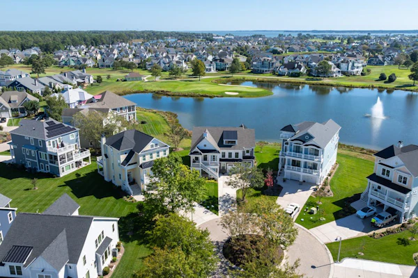 Elegant coastal retreat with golf course & pond views and bayside beach