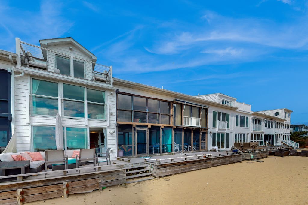 Newly renovated beachfront townhome with lovely unique decor, firepit, & deck