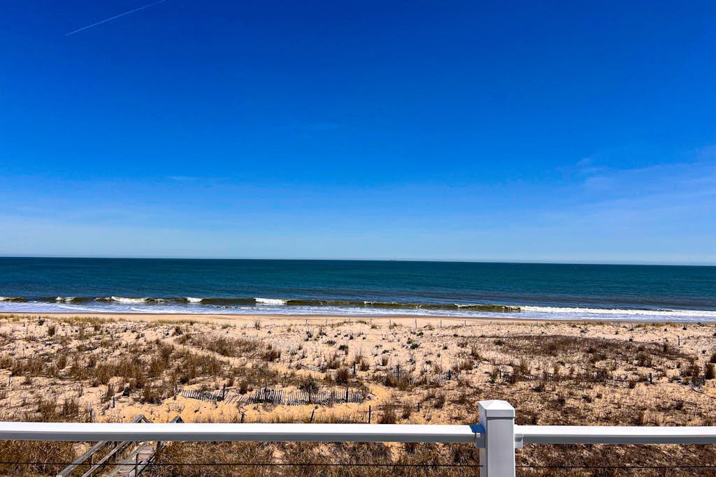 Newly renovated beachfront townhome with lovely unique decor, firepit, & deck