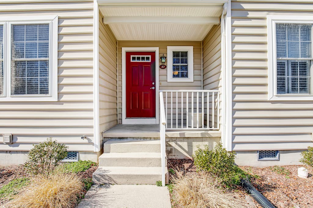 Oyster Bay Villas townhome with free WiFi, screened patio, & shared pool
