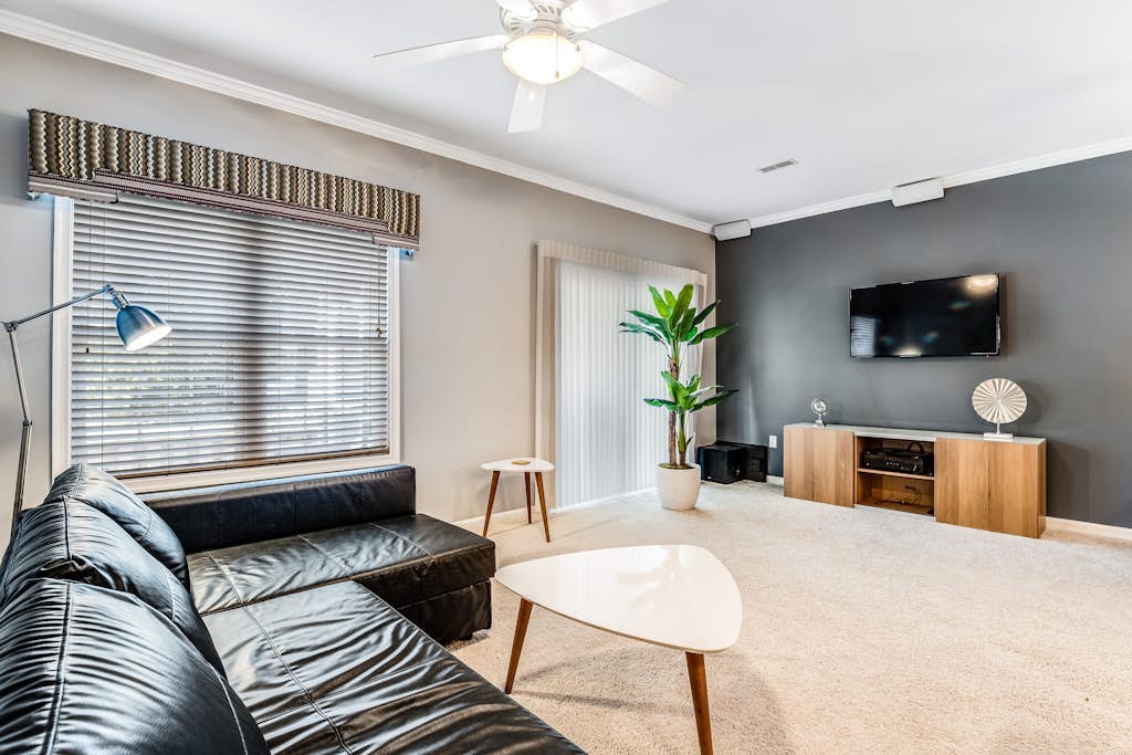 Oyster Bay Villas townhome with free WiFi, screened patio, & shared pool