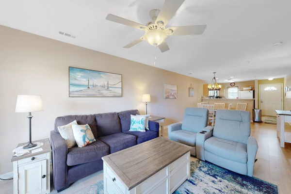 The Palms condo with a furnished balcony, pond view, washer/dryer, & pool